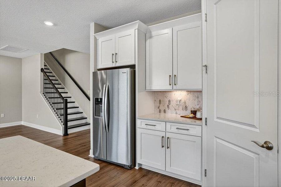 Furnished interior view inside a new home in Legends Preserve - Reserve Series, Daytona Beach (Image 12). Furnished interior view inside a new home in Legends Preserve - Reserve Series, Daytona Beach (Image 12).