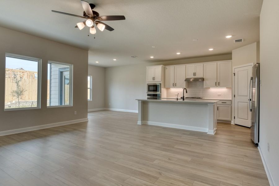 Representative unfurnished interior of a home built from the Kennedy by Ashton Woods in Hennersby Hollow, San Antonio (Image 16). Representative unfurnished interior of a home built from the Kennedy by Ashton Woods in Hennersby Hollow, San Antonio (Image 16).