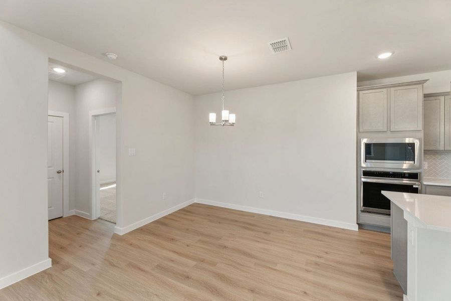 Representative unfurnished interior of a home built from the Poinsettia by Hakes Brothers in Veranda Signature, San Antonio (Image 23). Representative unfurnished interior of a home built from the Poinsettia by Hakes Brothers in Veranda Signature, San Antonio (Image 23).