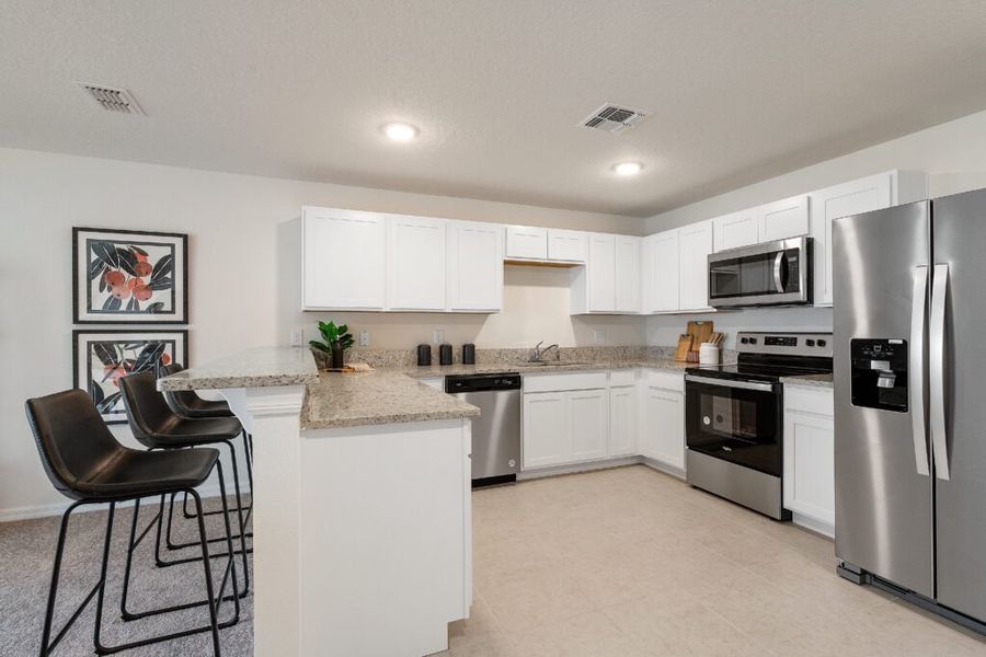 Representative furnished interior of a home built from the King by Holiday Builders in Poinciana, Poinciana (Image 6). Representative furnished interior of a home built from the King by Holiday Builders in Poinciana, Poinciana (Image 6).