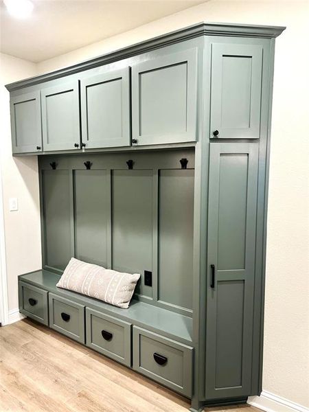 Mudroom with light wood-type flooring and baseboards Mudroom with light wood-type flooring and baseboards