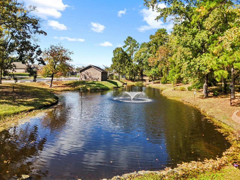 This peaceful community pond is such a lovely place to pause and enjoy the sound of the fountain as it sparkles across the water. Surrounded by mature trees and gentle landscaping it offers a quiet moment of nature right within the neighborhood. It is the kind of tranquil setting that makes everyday living feel a little more relaxing. This peaceful community pond is such a lovely place to pause and enjoy the sound of the fountain as it sparkles across the water. Surrounded by mature trees and gentle landscaping it offers a quiet moment of nature right within the neighborhood. It is the kind of tranquil setting that makes everyday living feel a little more relaxing.