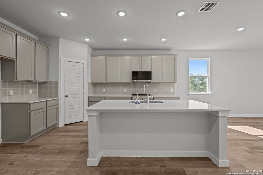 Furnished interior view inside a new home in Cinco Lakes, San Antonio (Image 11).