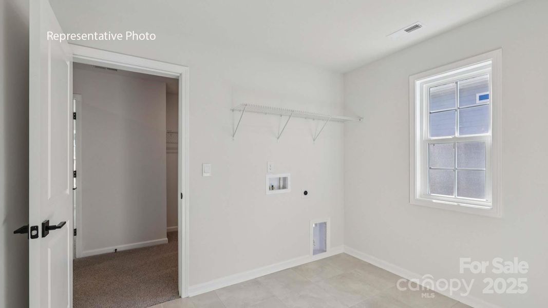 Spacious, unfurnished interior of a new home in Sanctuary at Southgate, Indian Trail (Image 16).