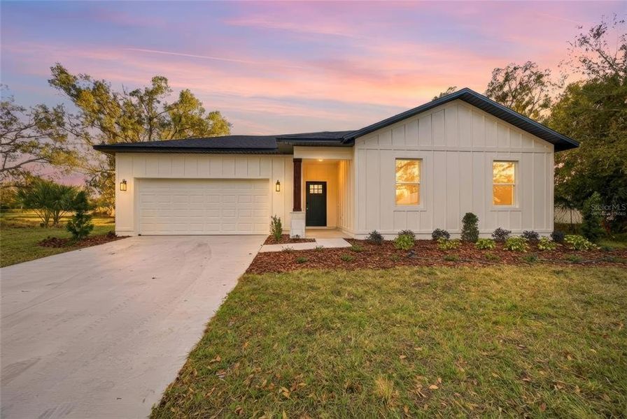 Front exterior of a new home in , Plant City, FL, highlighting curb appeal (Image 22). Front exterior of a new home in , Plant City, FL, highlighting curb appeal (Image 22).