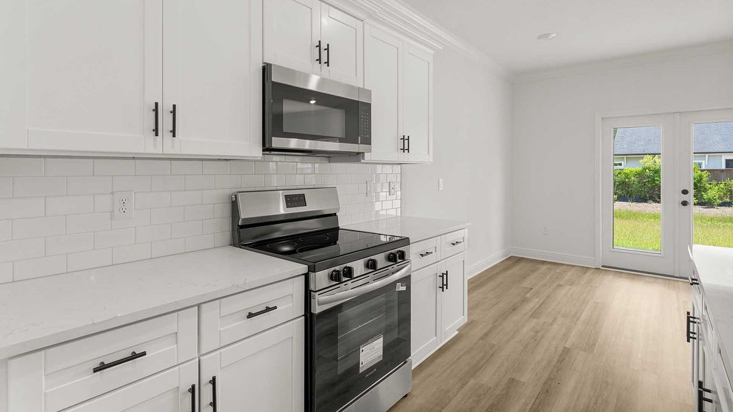 Furnished interior view inside a new home in Nellie Preserve, Santa Rosa Beach (Image 7).