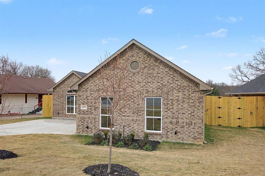 Front exterior of a new home in , Dallas, TX, highlighting curb appeal (Image 19).