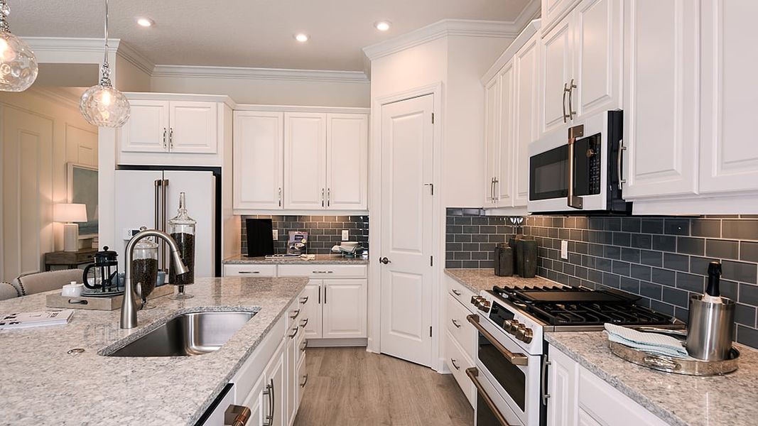 Furnished interior view inside a new home in Esplanade at Azario Lakewood Ranch, Bradenton (Image 5). Furnished interior view inside a new home in Esplanade at Azario Lakewood Ranch, Bradenton (Image 5).