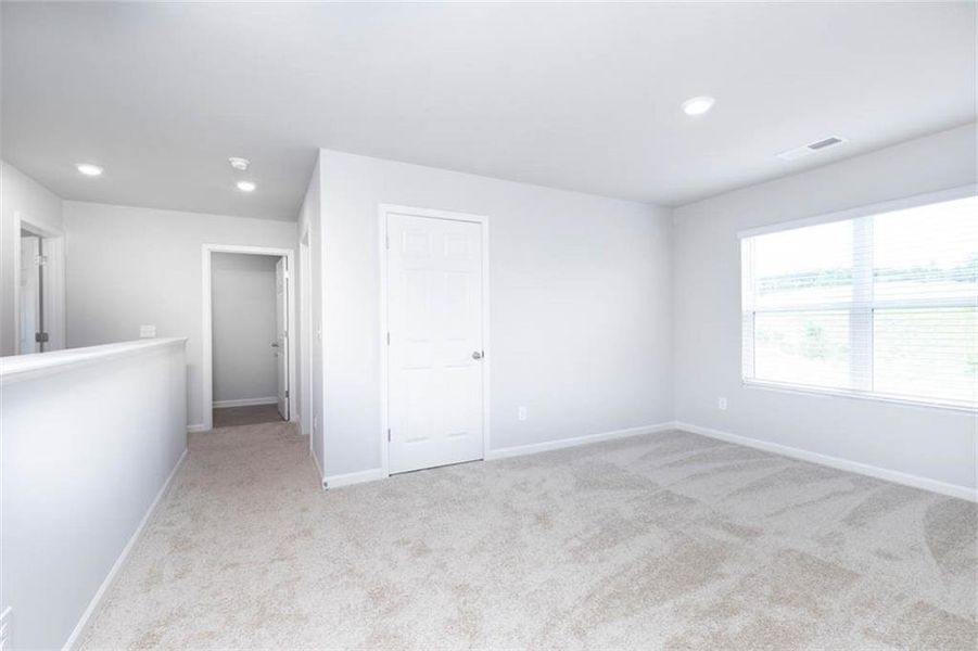 Spacious, unfurnished interior of a new home in The Reserve at Calcutta, Stockbridge (Image 25).