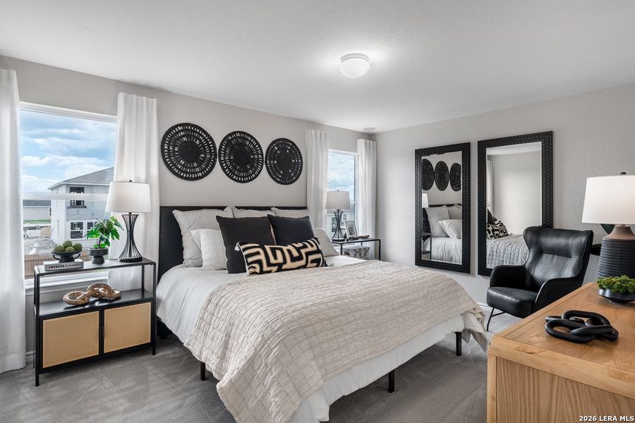 Furnished interior view inside a new home in Preserve at Culebra - Villa Collection, San Antonio (Image 3).