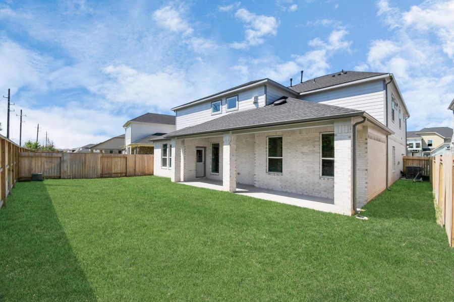 Explore the expansive backyard with its inviting covered patio—a perfect blend of space for the kids to play and adults to unwind. Ideal for creating your outdoor oasis, this backyard accommodates patio furniture, a BBQ pit, and endless possibilities for leisure and entertainment.
