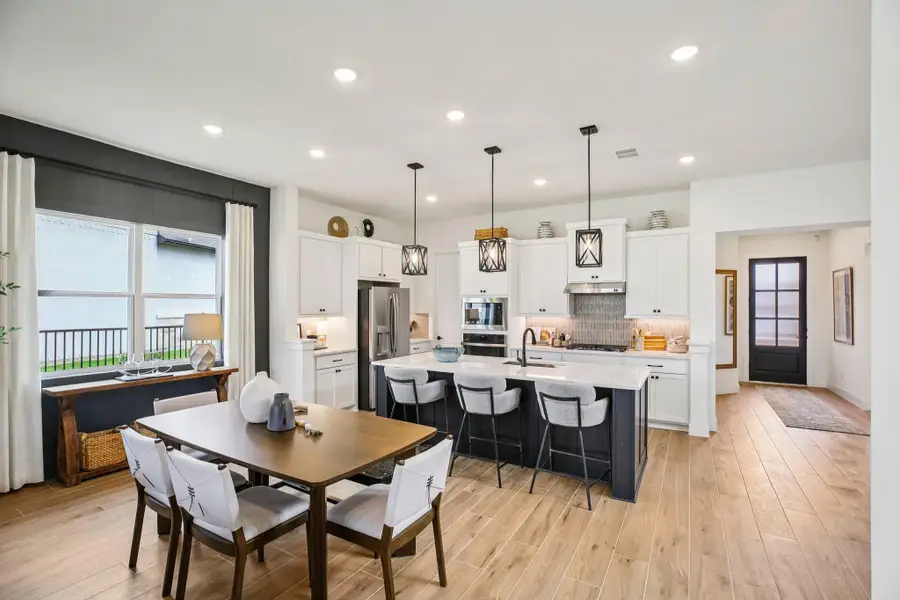 Furnished interior view inside a new home in Bridgeland, Cypress (Image 6).