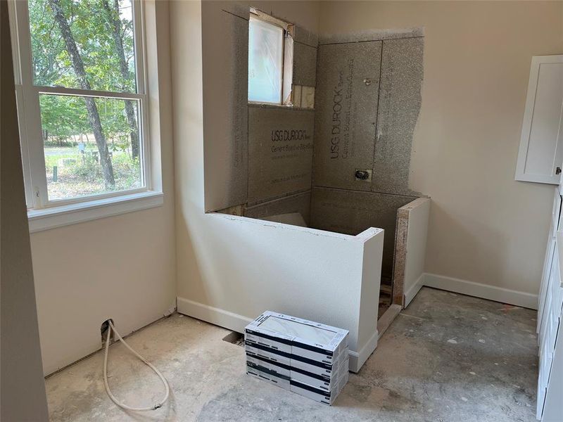 Large step-in tiled shower and soaking tub, with private potty room. Large step-in tiled shower and soaking tub, with private potty room.