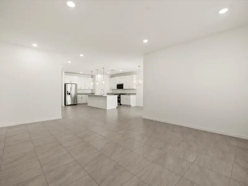 Spacious, unfurnished interior of a new home in Entrada Reserve Series, Tolleson (Image 8).