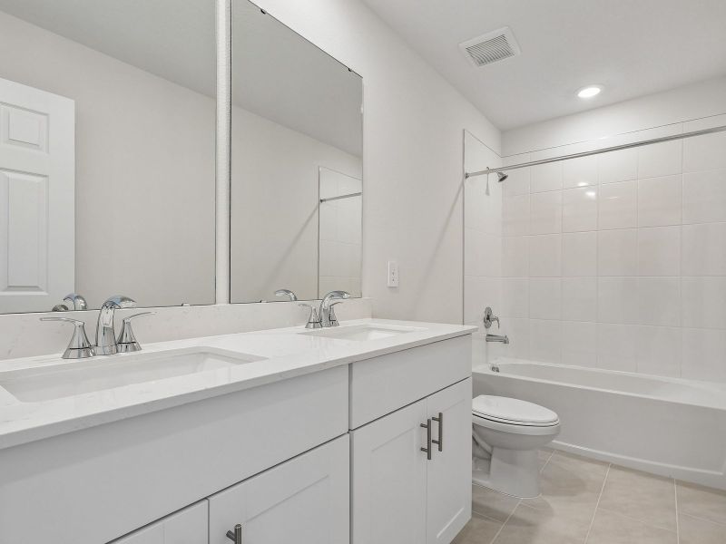 Furnished interior view inside a new home in Crosswinds - Signature Series, Haines City (Image 5).