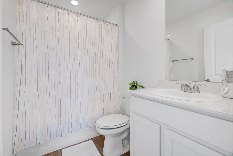 Furnished interior view inside a new home in Pinewood at Grand Texas: Colonial & Cottage Collections, New Caney (Image 23).
