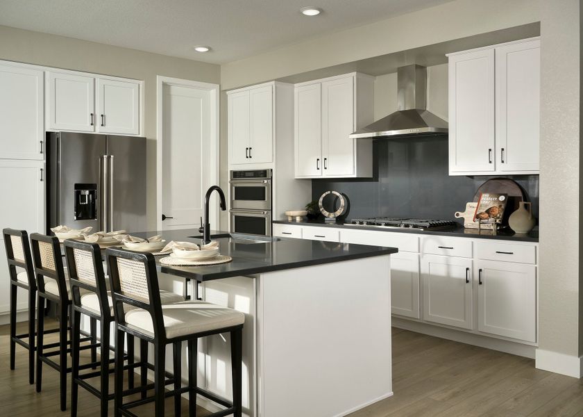 Furnished interior view inside a new home in Barefoot, Firestone (Image 3).