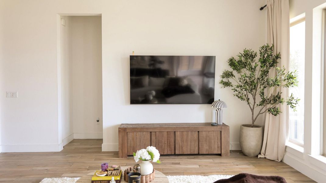 Sun-filled interiors complement light hardwood flooring and clean, minimalist decor. Sun-filled interiors complement light hardwood flooring and clean, minimalist decor.