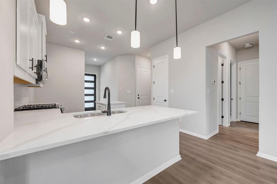 Furnished interior view inside a new home in Heritage, Dripping Springs (Image 7).