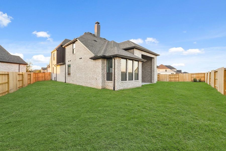 Exterior details and patio area of a home in Grange, Katy (Image 2).