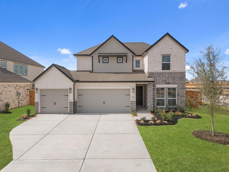 Front exterior of a new home in Sunterra Lakes, Fulshear, TX, highlighting curb appeal (Image 19).