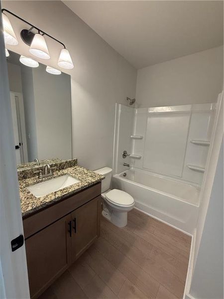 Furnished interior view inside a new home in The Fairways at Mirror Lake, Villa Rica (Image 7).