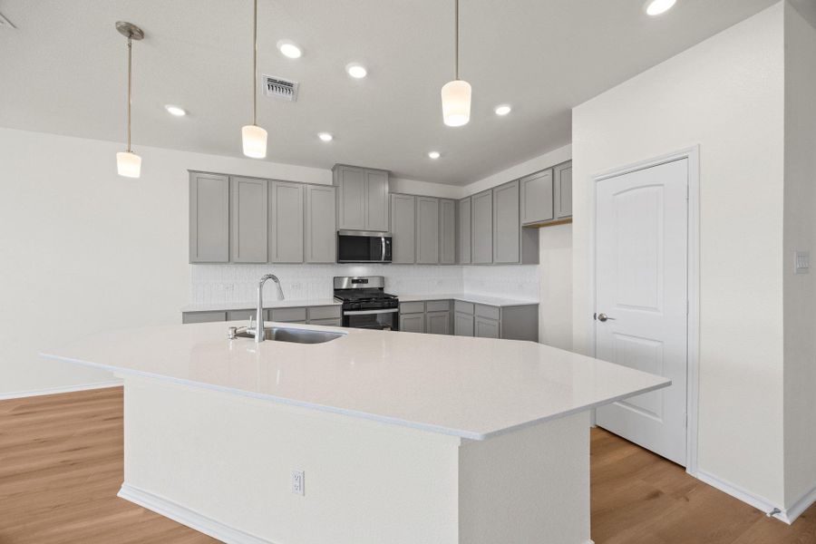 Furnished interior view inside a new home in Salerno - Classic Collection, Round Rock (Image 7).