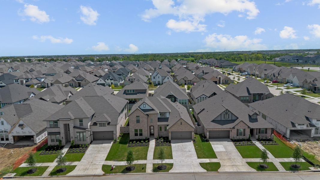 Front exterior of a new home in Pomona 60', Manvel, TX, highlighting curb appeal (Image 21). Front exterior of a new home in Pomona 60', Manvel, TX, highlighting curb appeal (Image 21).