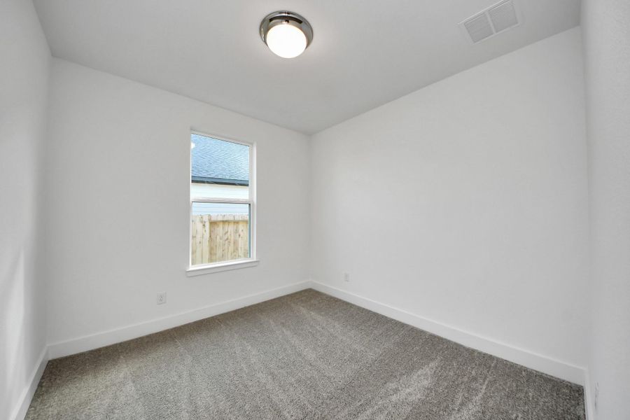 Spacious, unfurnished interior of a new home in The Canopies, Splendora (Image 12).