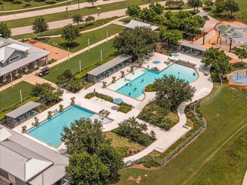 Resort-style community pool with lounge areas and inviting recreational amenities.