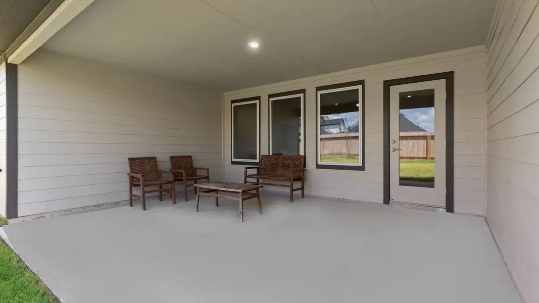 Exterior details and patio area of a home in Tamarron, Fulshear (Image 2). Exterior details and patio area of a home in Tamarron, Fulshear (Image 2).