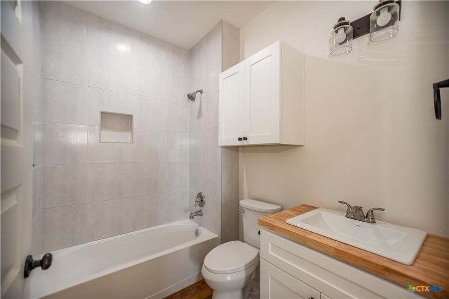 Furnished interior view inside a new home in , Port Lavaca (Image 7).