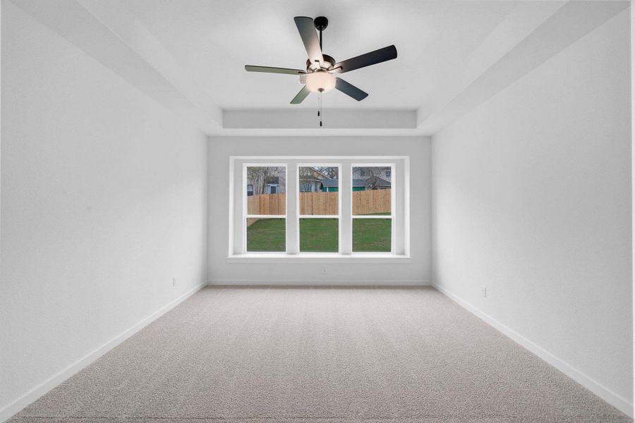 Primary Bedroom with elevated ceiling