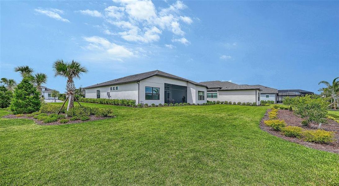 Front exterior of a new home in , Sarasota, FL, highlighting curb appeal (Image 22).