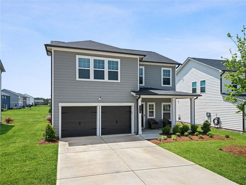Front exterior of a new home in Alder Park, Conyers, GA, highlighting curb appeal (Image 28).