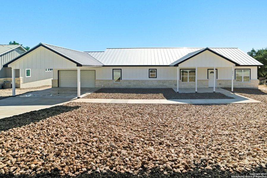 Exterior details and patio area of a home in , Lakehills (Image 21).