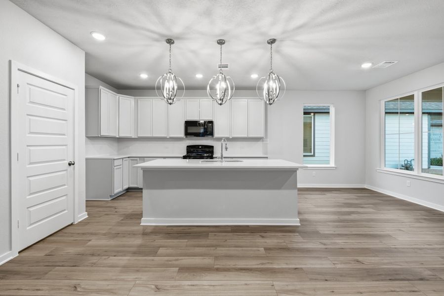 Furnished interior view inside a new home in Heartland at Creek Meadows, College Station (Image 4). Furnished interior view inside a new home in Heartland at Creek Meadows, College Station (Image 4).
