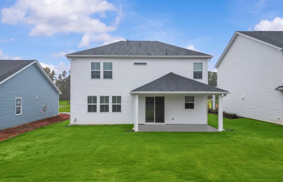 Exterior details and patio area of a home in Fox Hollow, Spartanburg (Image 3).