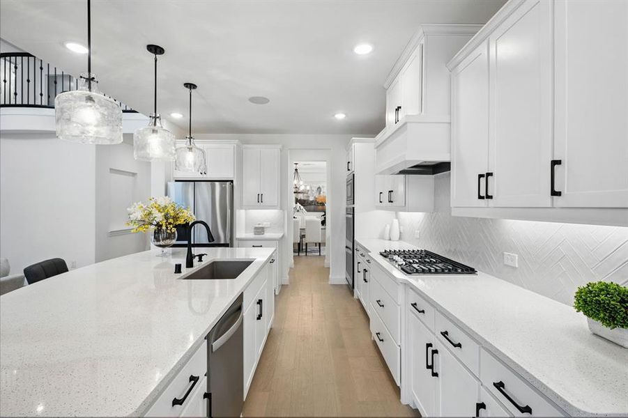 Kitchen leading to the butler's pantry and dining room.