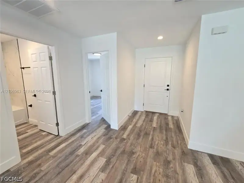 Spacious, unfurnished interior of a new home in , Port Charlotte (Image 15).