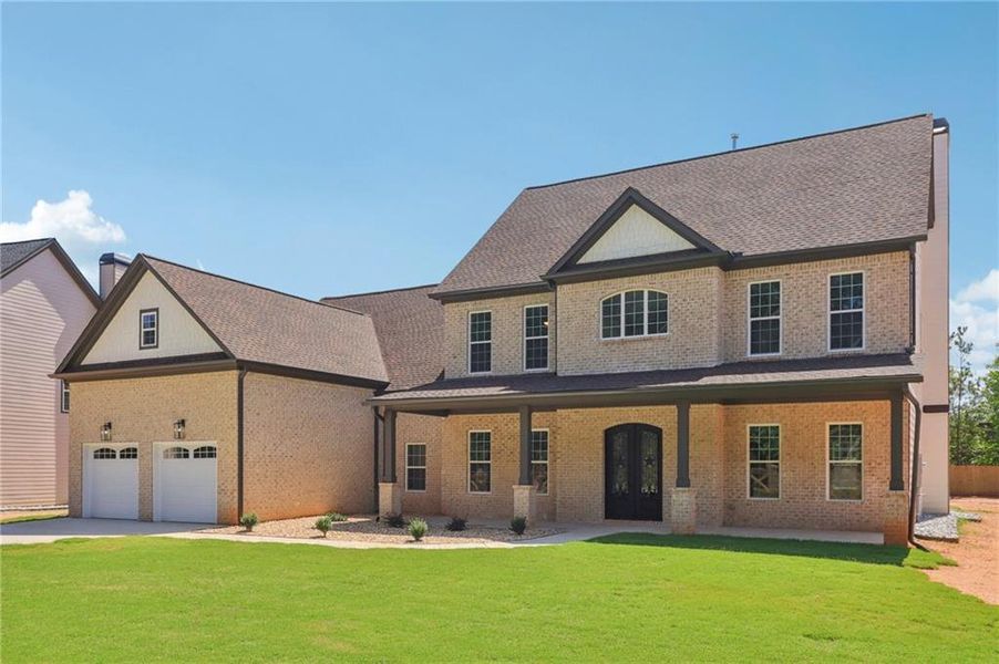 Front exterior of a new home in , Lilburn, GA, highlighting curb appeal (Image 29).