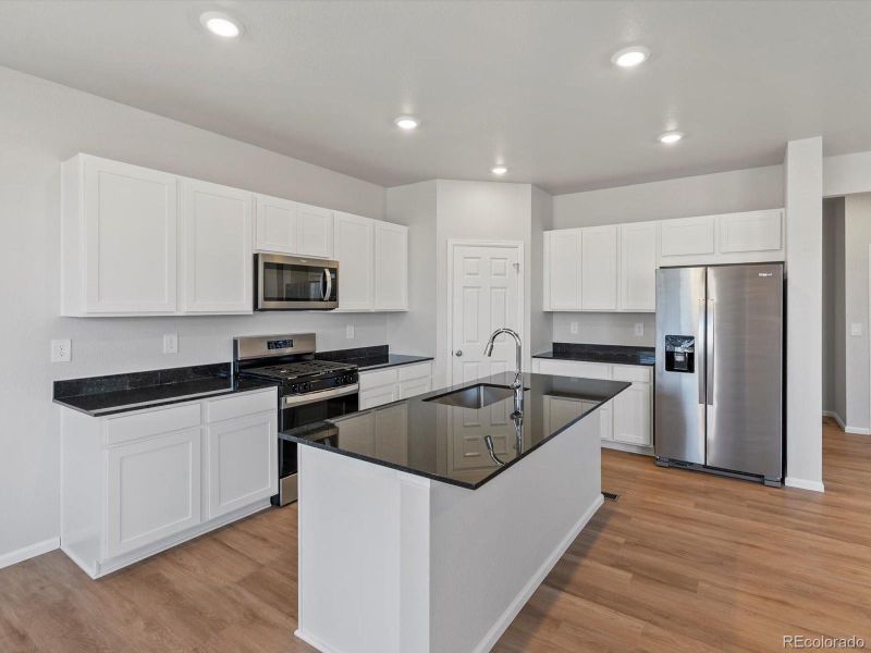 Furnished interior view inside a new home in Lake Bluff, Greeley (Image 4).