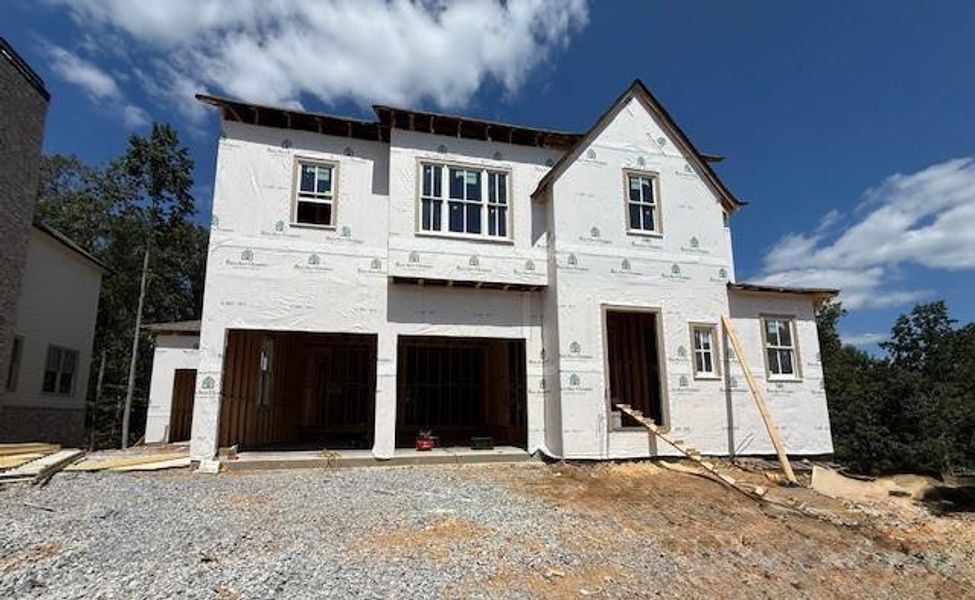 Front exterior of a new home in , Ball Ground, GA, highlighting curb appeal (Image 2).