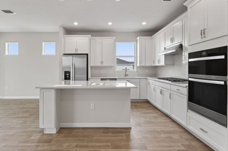 Furnished interior view inside a new home in Del Webb Tradition, Port St. Lucie (Image 41).