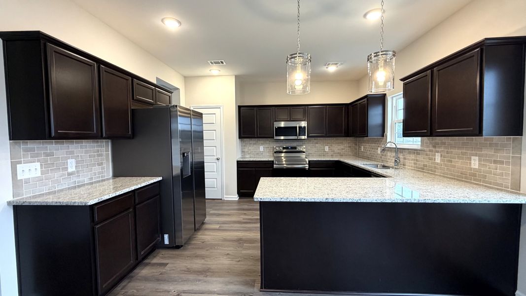 Furnished interior view inside a new home in Grand Reserve, Hinesville (Image 5).