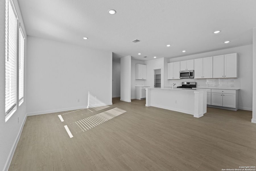 Spacious, unfurnished interior of a new home in Waterwheel: Coastline Collection, San Antonio (Image 21).