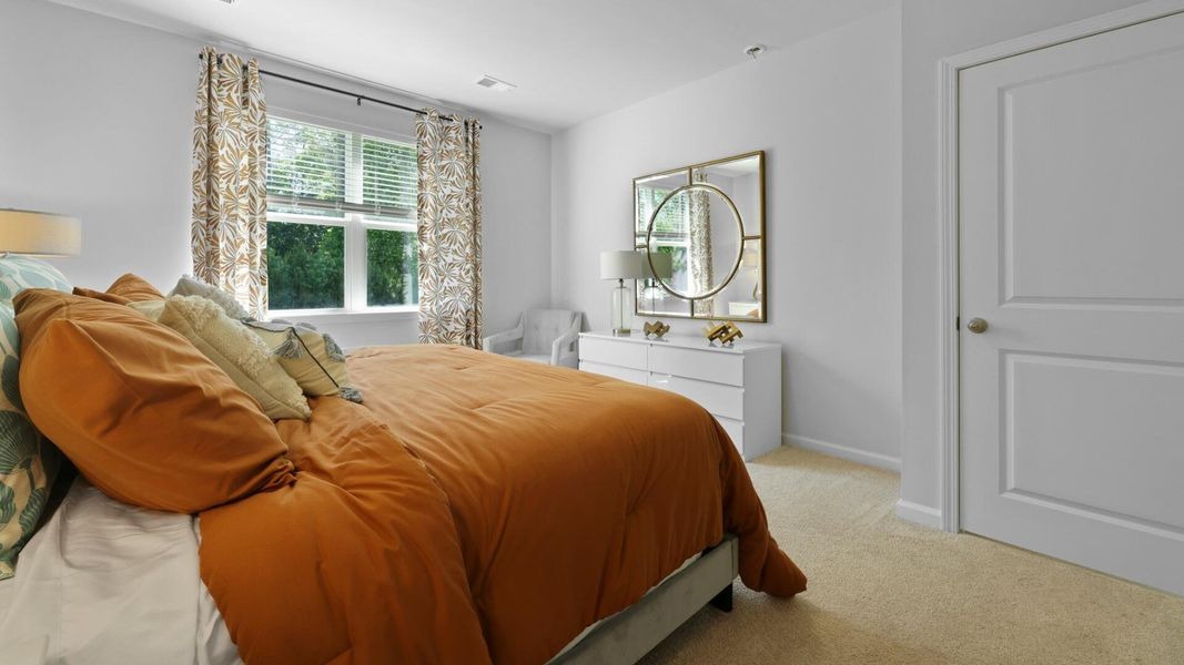 Furnished interior view inside a new home in Pine Hills at Cane Bay, Summerville (Image 17).