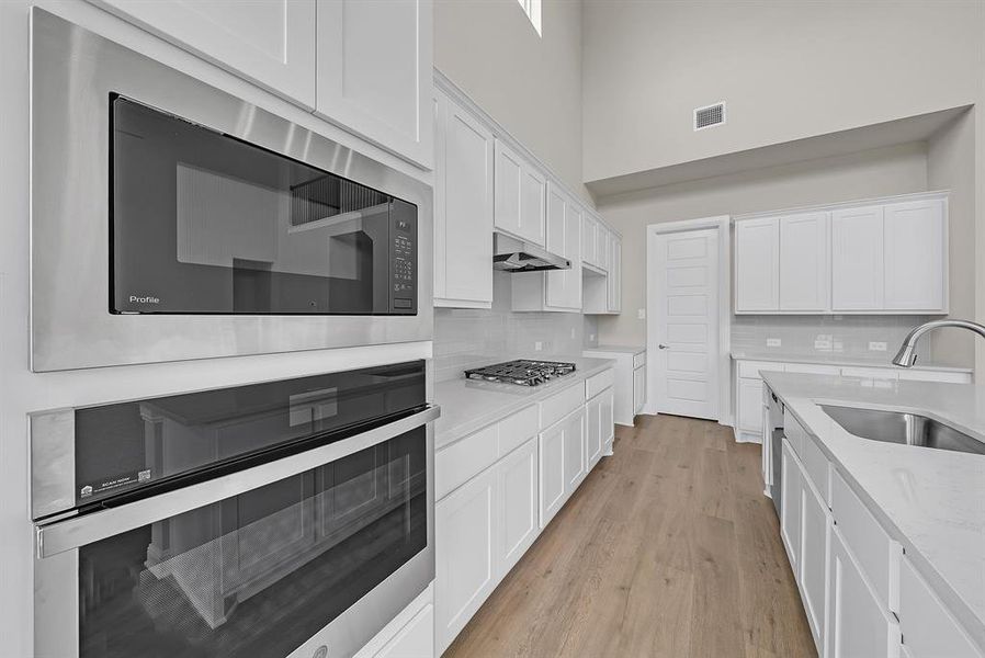 Furnished interior view inside a new home in Eagle Estates, Cross Timber (Image 10).