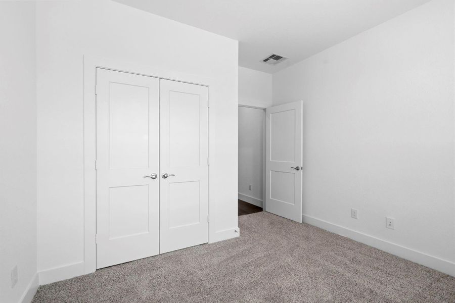 Spacious, unfurnished interior of a new home in Meridiana, Manvel (Image 15).