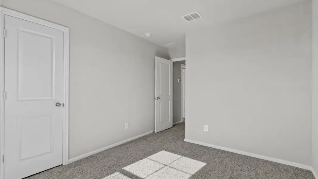 Representative unfurnished interior of a home built from the Midland by D.R. Horton in Audra Oaks, Denton (Image 39).